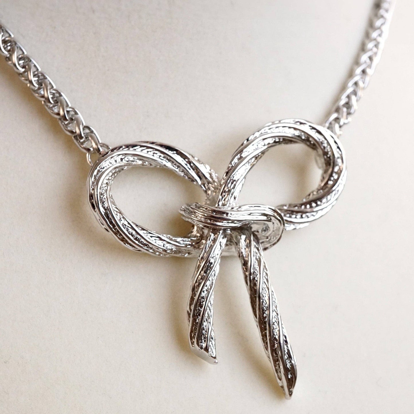 Large Rope Textured Bow Pendant Statement Necklace Silver Tone