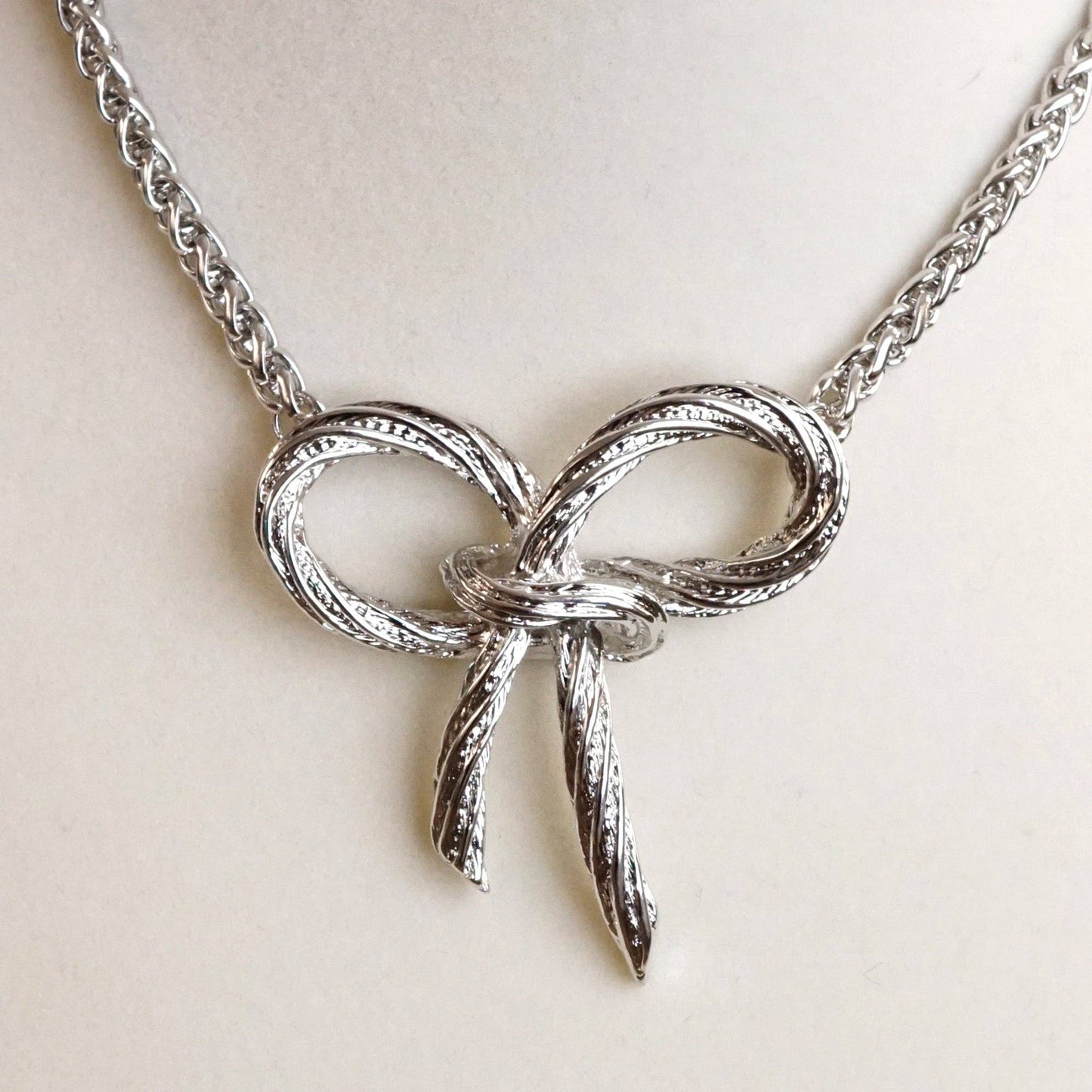 Large Rope Textured Bow Pendant Statement Necklace Silver Tone